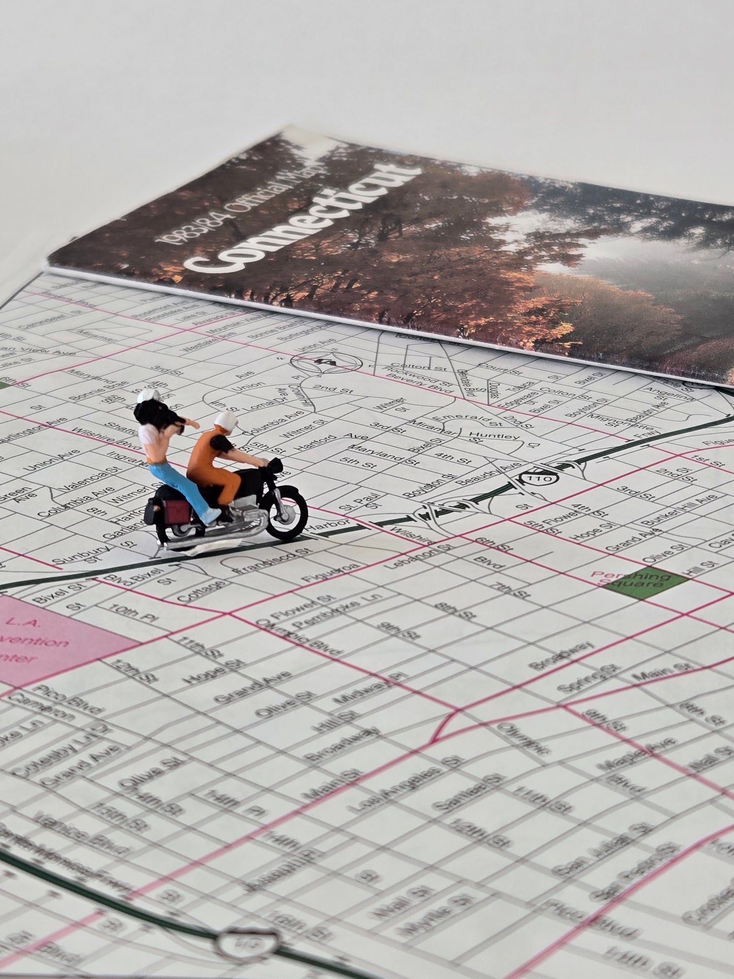 Biker Riding on a Map Greeting Card