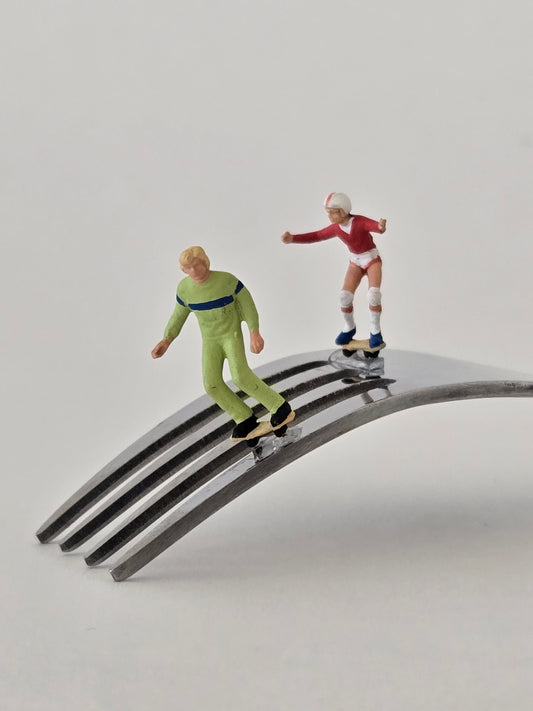 Skateboarders on a Fork Greeting Card