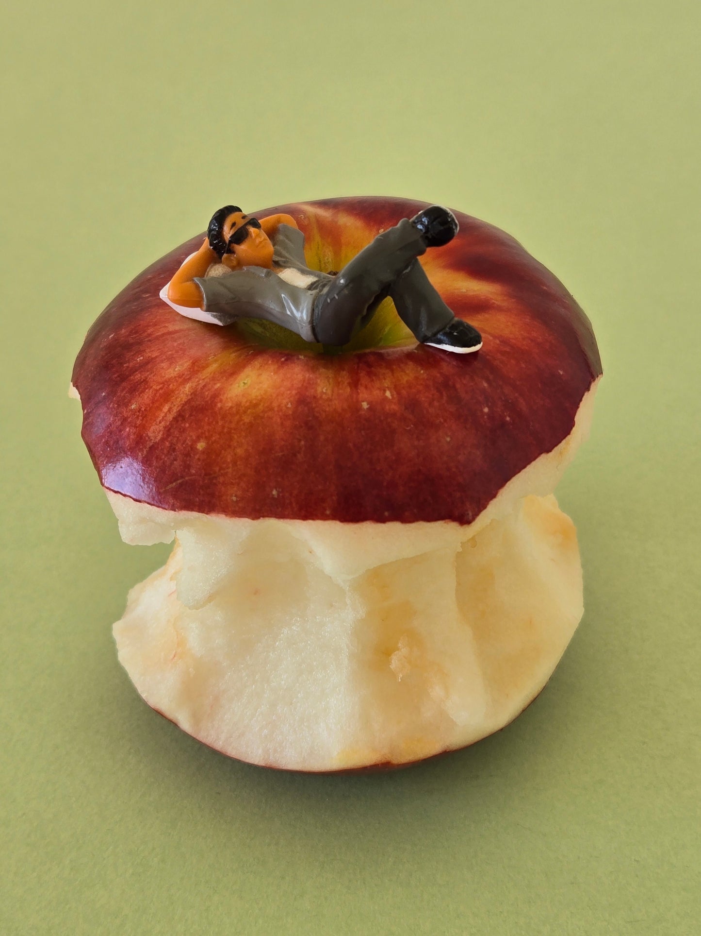 Man Napping on an Apple Greeting Card