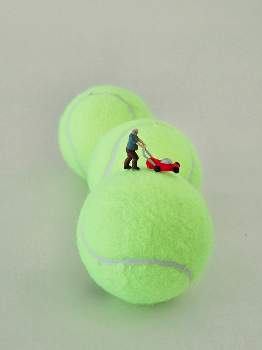 Man Mowing Tennis Ball Lawn Greeting Card