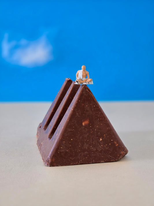 Buddha Sitting on Top of Toblerone Chocolate Mountain Greeting Card