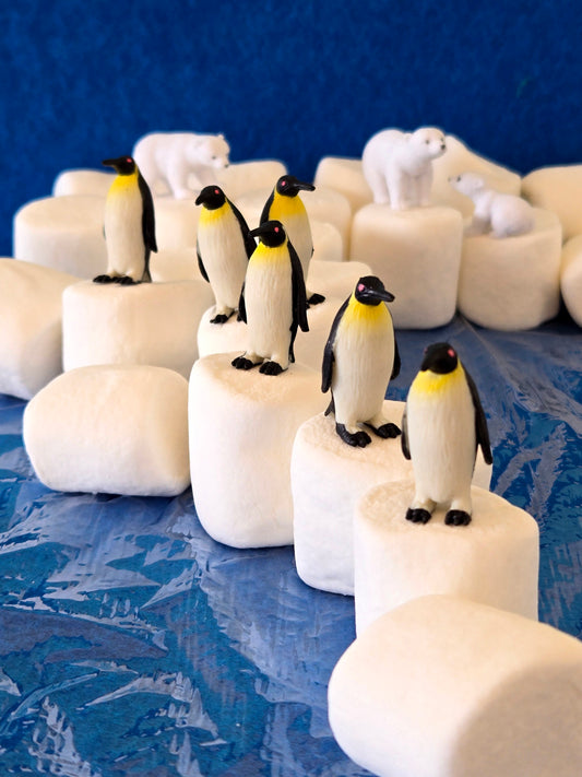 Penguins on Marshmallows Greeting Card
