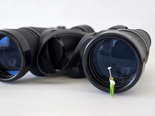 Cleaning a Binoculars Lens Greeting Card