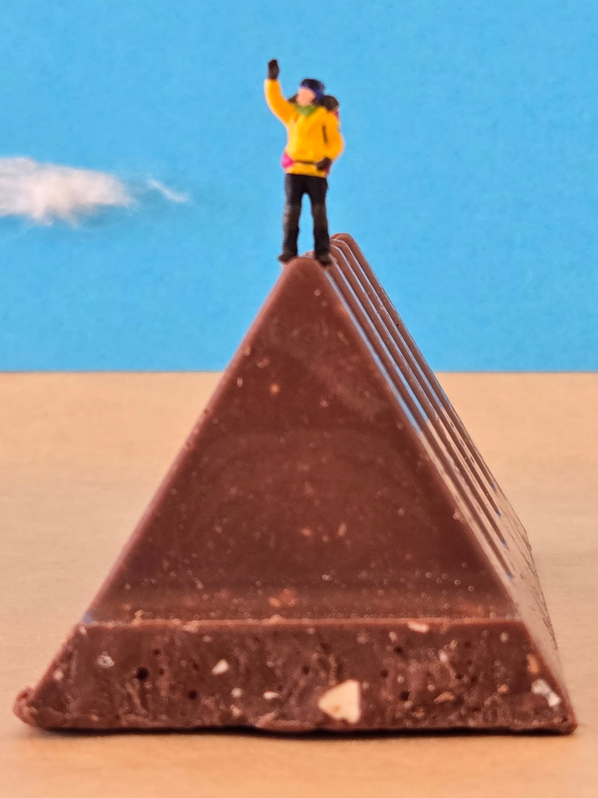 Hiker Standing on Top of Toblerone Chocolate Mountain Greeting Card
